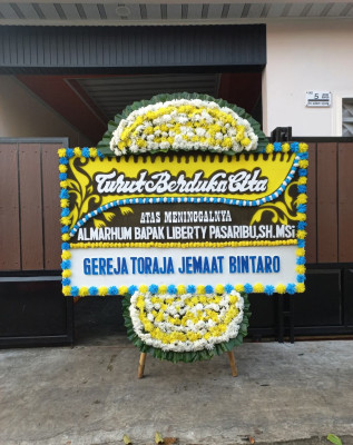 Papan Bunga Duka di Tapian Dolok